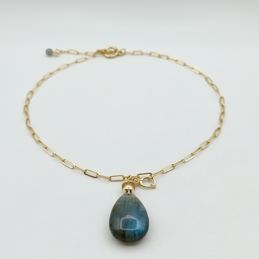 14K gold-plated brass chain necklace with large labradorite teardrop pendant on white textured background
Fugugemz