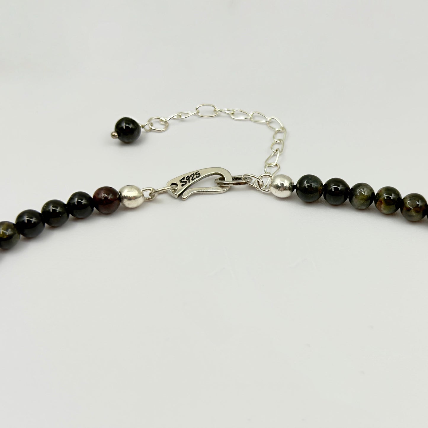 Detail of S925 sterling silver lobster clasp and extension chain