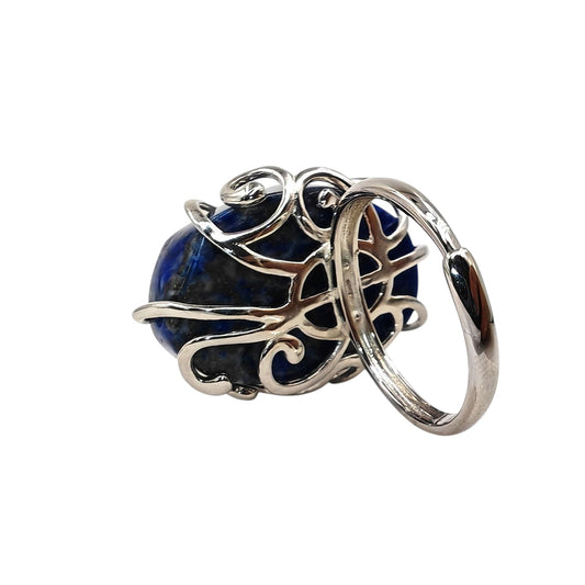 Side view of lapis lazuli ring showing depth and wirework