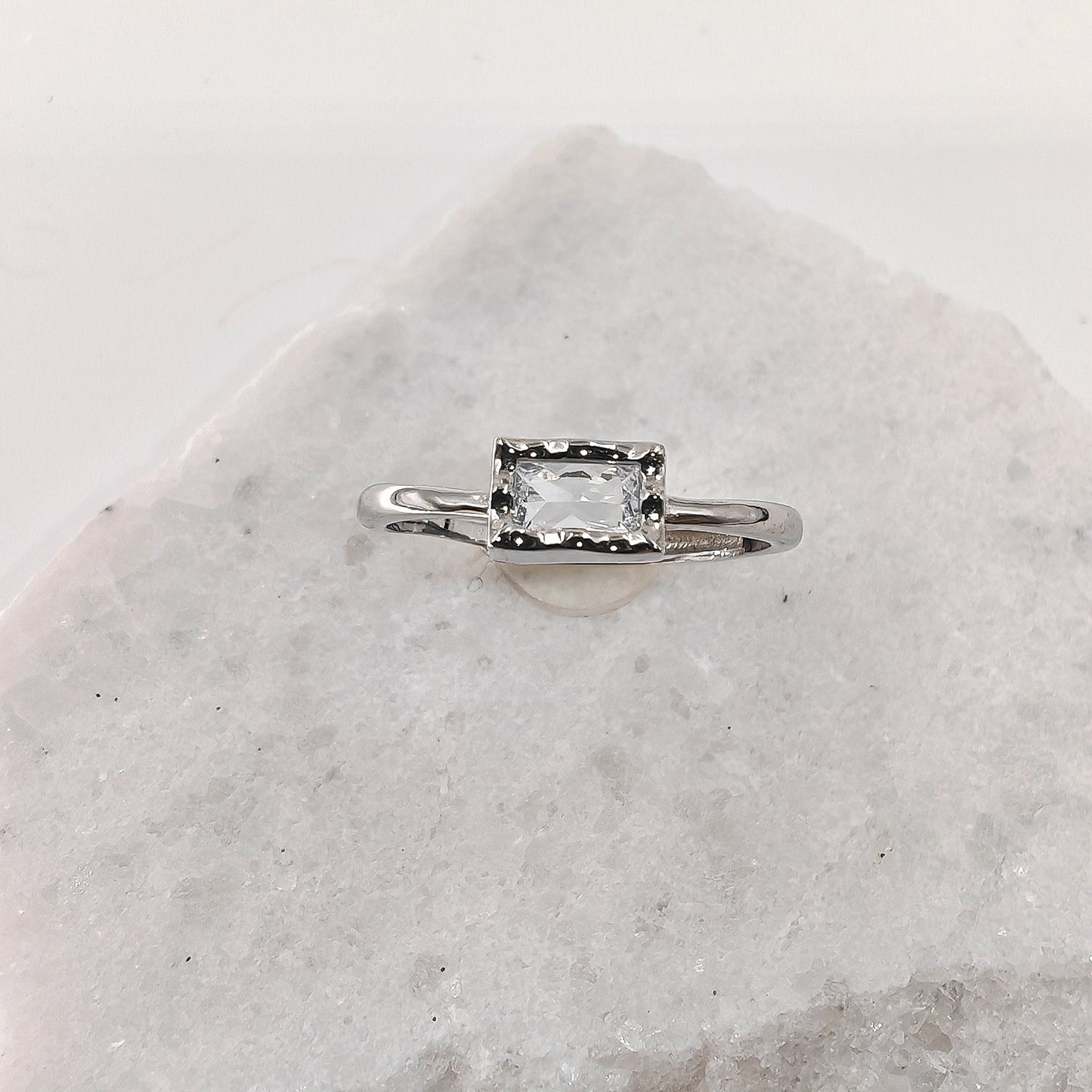 Adjustable 925 sterling silver ring with 4.5mm x 7mm rectangular zirconia