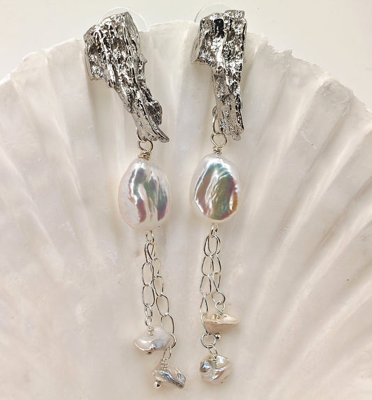 Platinum-plated dangle earrings with 16mm x 11.5mm baroque pearl and two 6.5mm pearls on 925 chain
