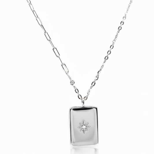 Close-up of rectangular pendant and zirconia star