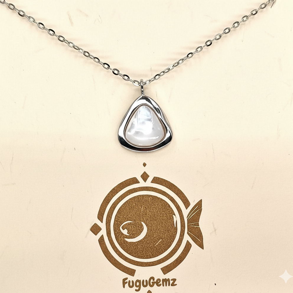 Necklace with a pendant on a beige card featuring FuguGemz branding.