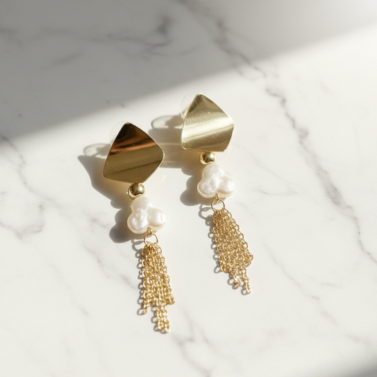 A pair of 71mm 14K gold-plated dangle earrings featuring a 12mm white cloverleaf-shaped pearl.