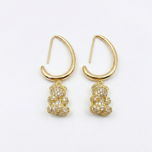 14k gold-plated bear charm earrings with zirconia inlays on white background