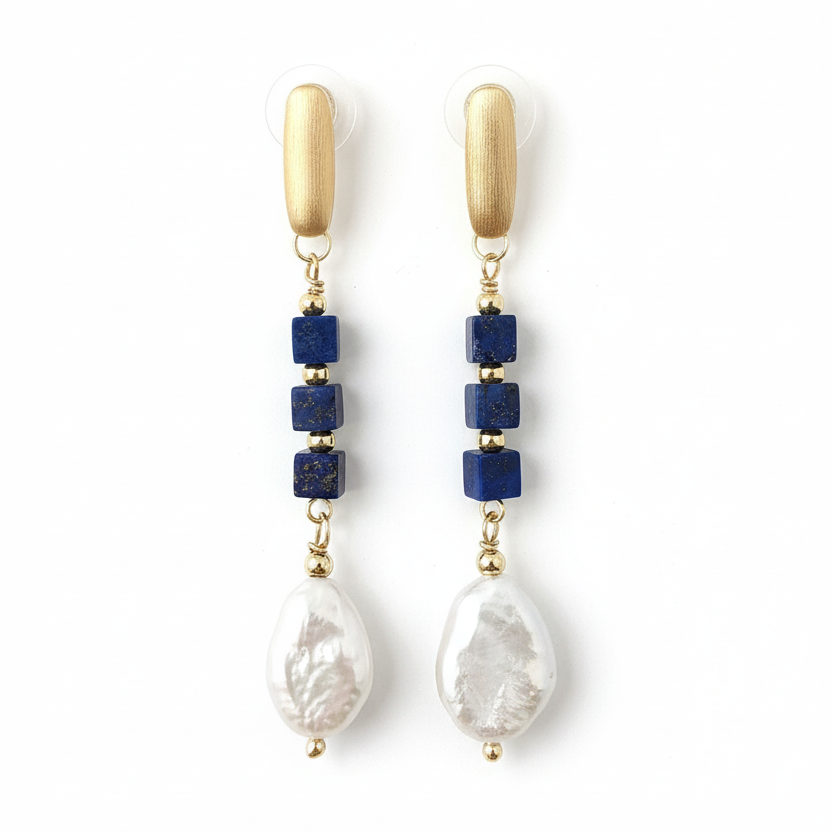 Close-up of lapis cubes and baroque pearl details
