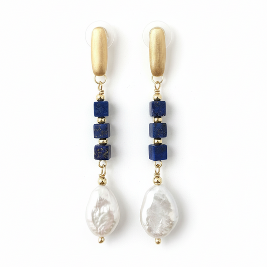Close-up of lapis cubes and baroque pearl details
