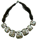 Large abalone shell pendant necklace on a 50cm matinee chain, showing the iridescent colors.