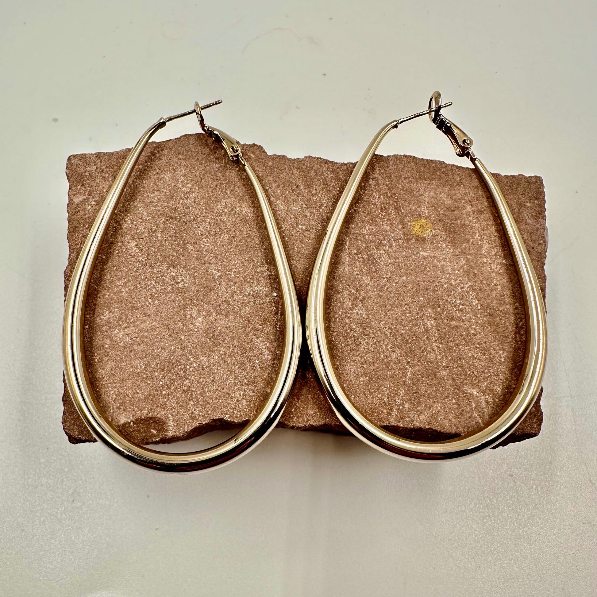 silver plated hammered teardrop hoops