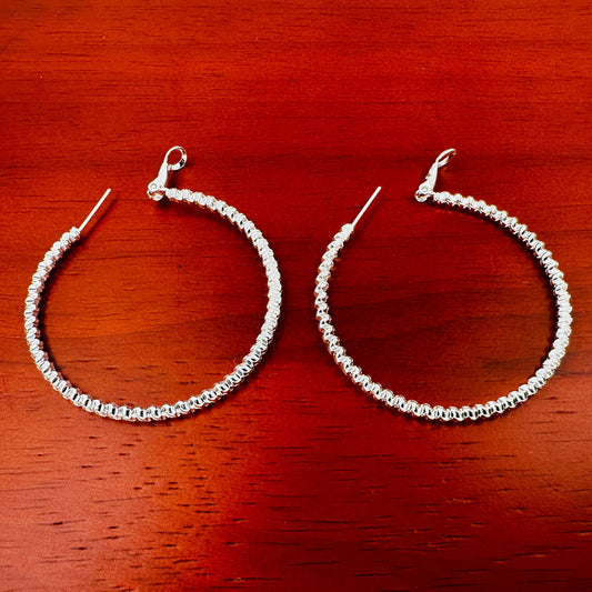 50mm woven hoop earrings with braided silver finish and 925 sterling silver needle