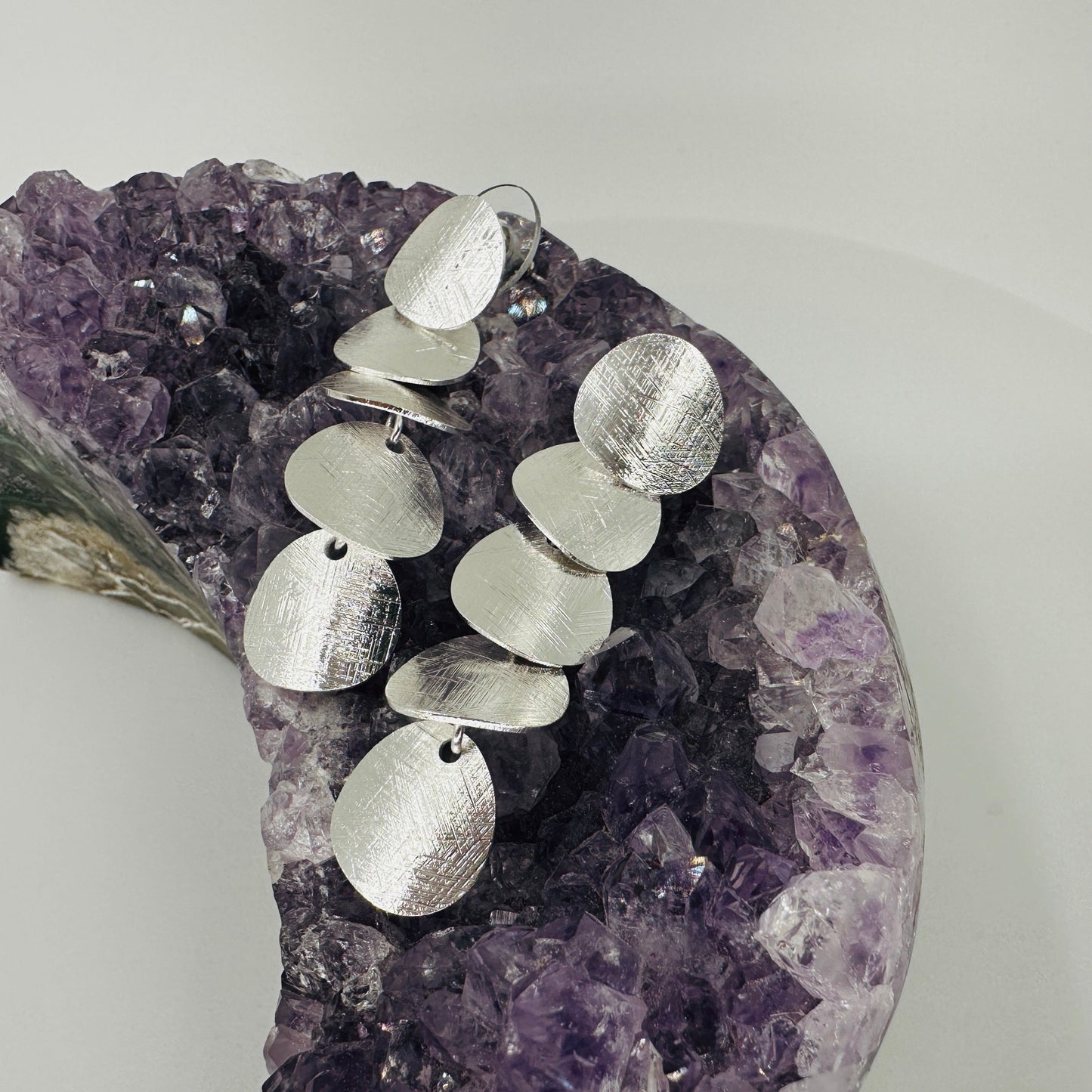 5-polka dot dangle earrings with brushed silver finish and 925 sterling silver needle
