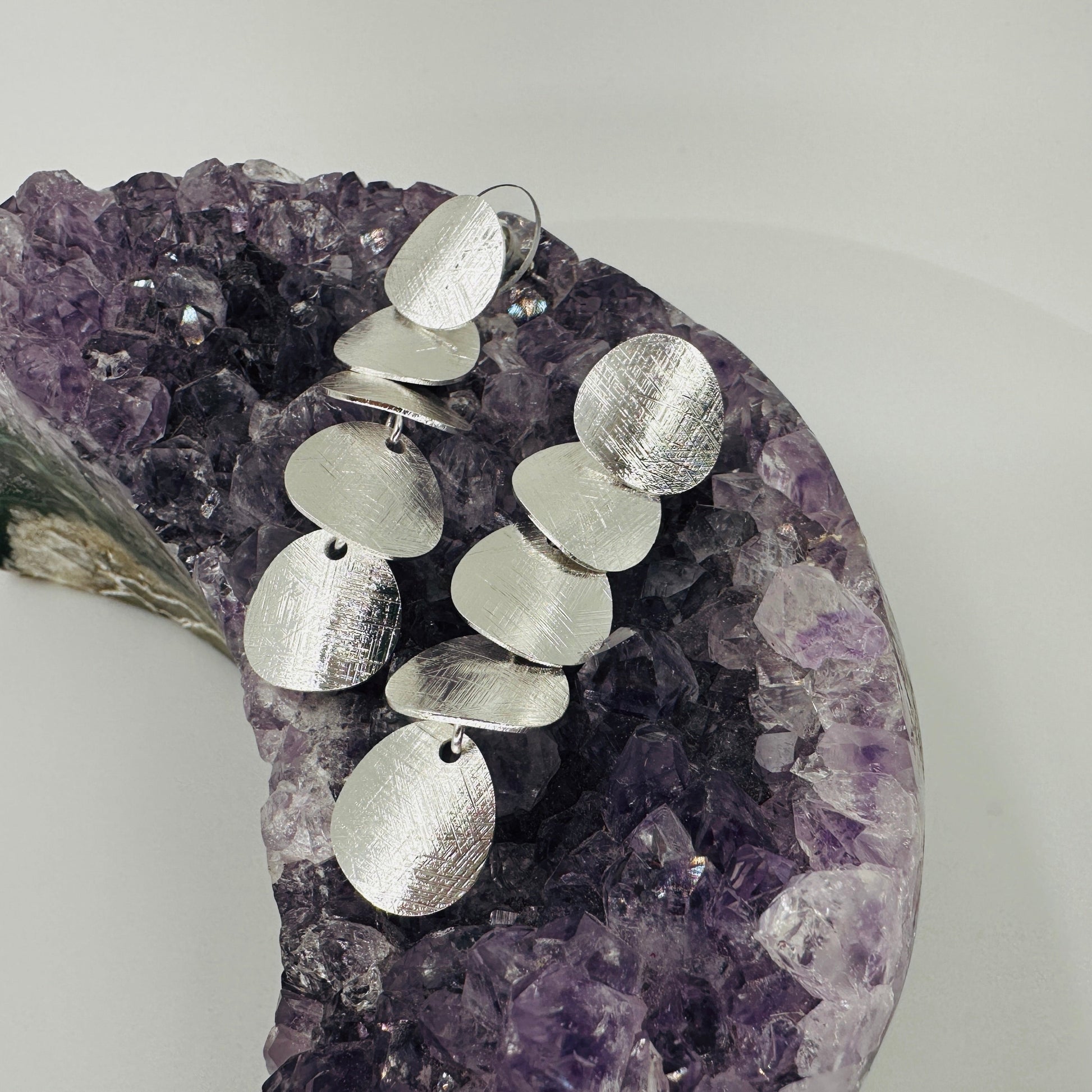 5-polka dot dangle earrings with brushed silver finish and 925 sterling silver needle
