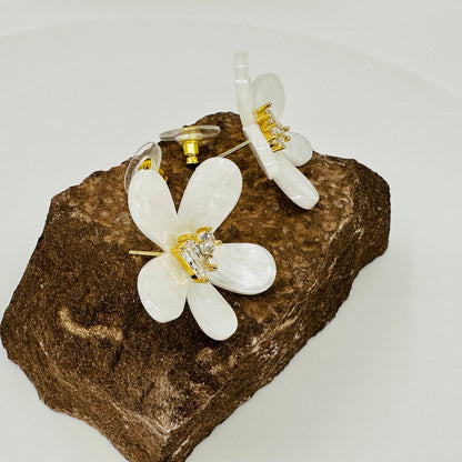 White resin iris flower stud earrings with dual zirconia centre and 925 sterling silver posts