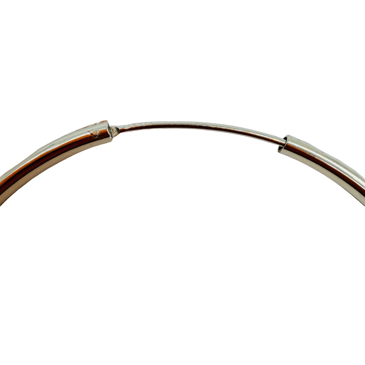 Close-up of snap closure on 30mm sterling silver hoop earrings