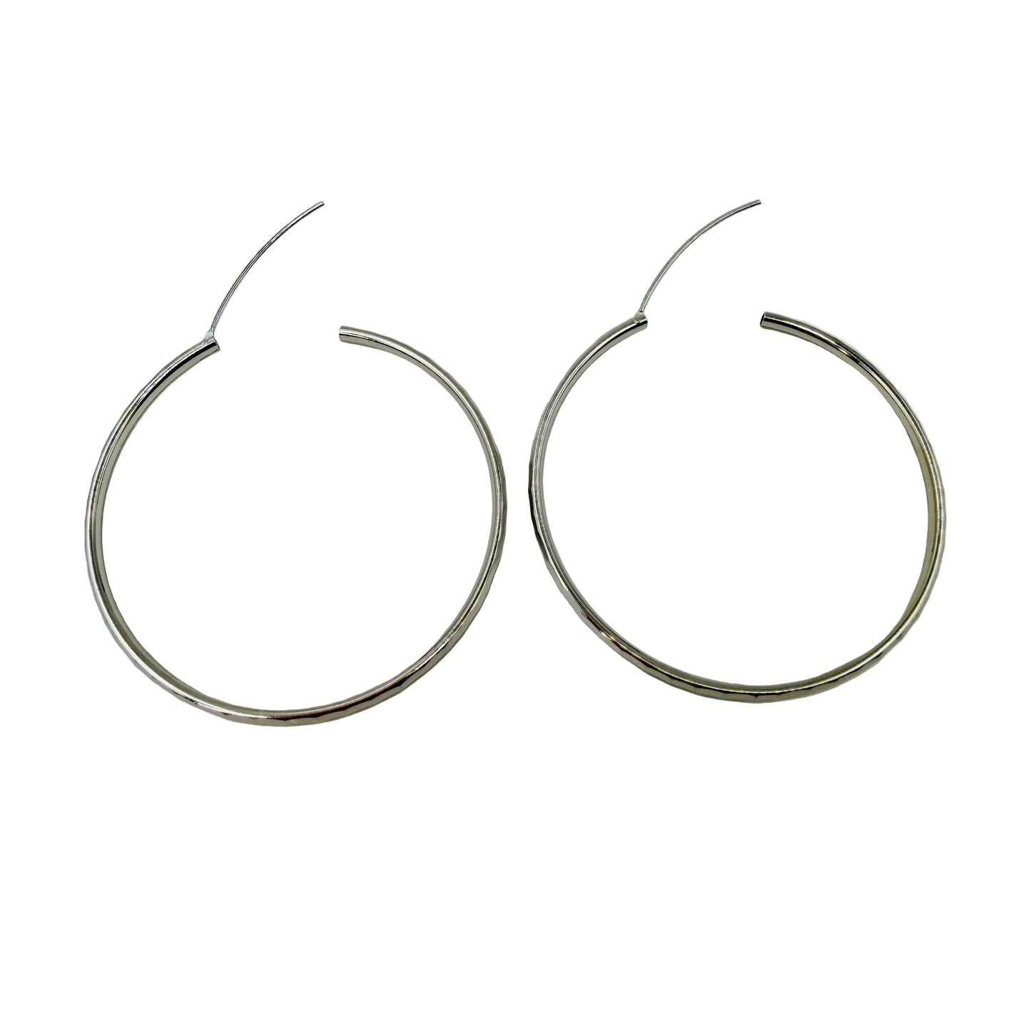 Close-up of endless closure on 30mm sterling silver hoop earrings