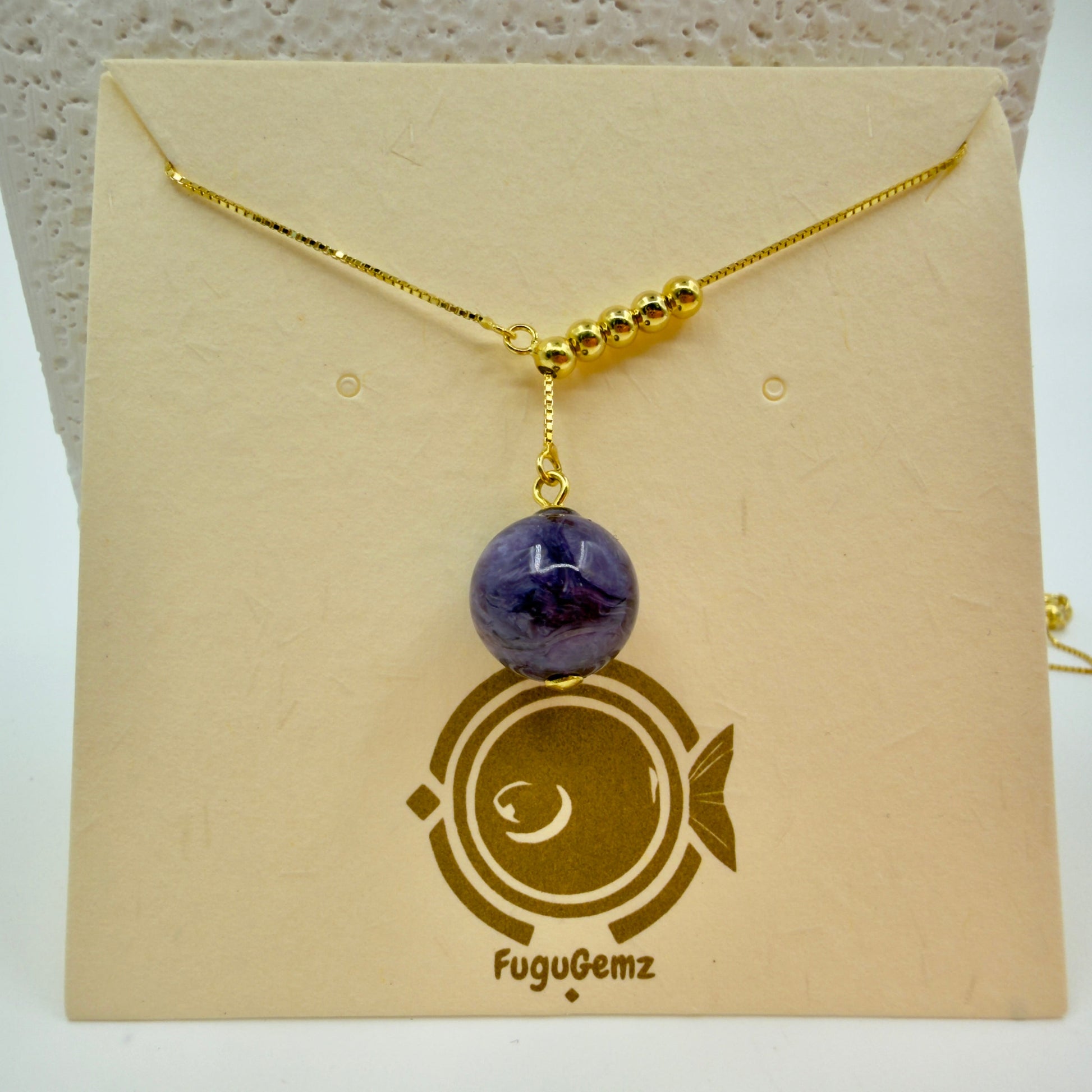 42cm 18k gold-plated necklace with 6x3mm gold beads and 11mm round charoite pendant on Fugugemz brand