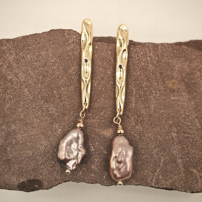 Dangle earrings with 14K gold-plated hooks and purple baroque pearls