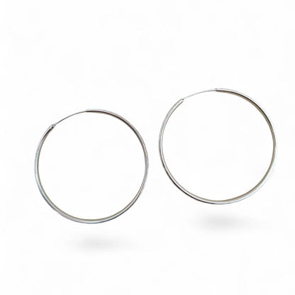 30mm sterling silver hoop earrings on a white background