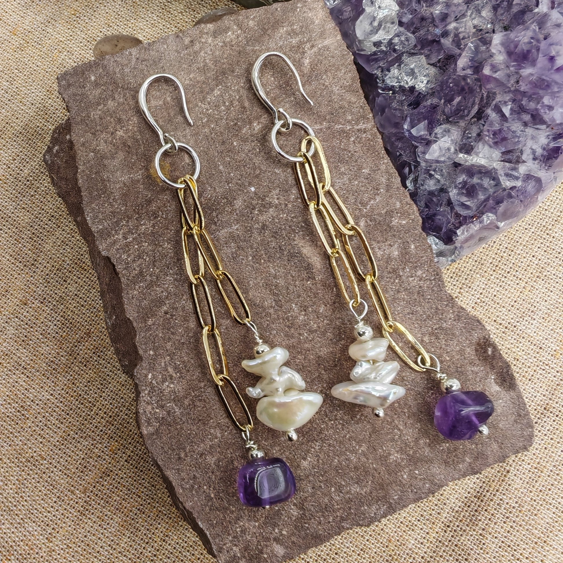 Sterling silver hook earrings with white baroque pearls and amethyst stones