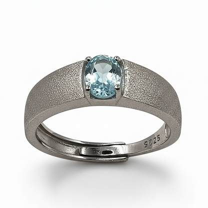 Close-up of zirconia stone and brushed silver texture