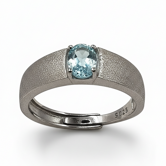 Close-up of zirconia stone and brushed silver texture