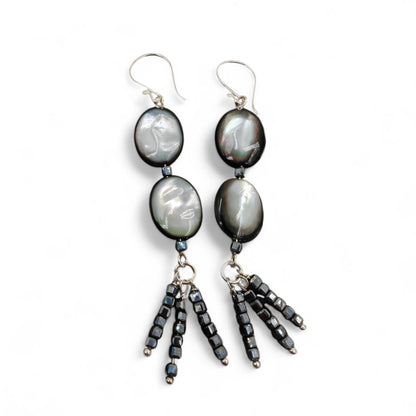 Close-up of mother-of-pearl and black spinel bead tassel