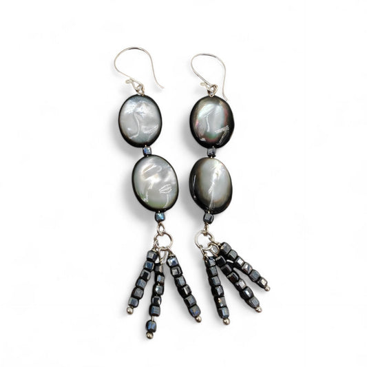 Close-up of mother-of-pearl and black spinel bead tassel