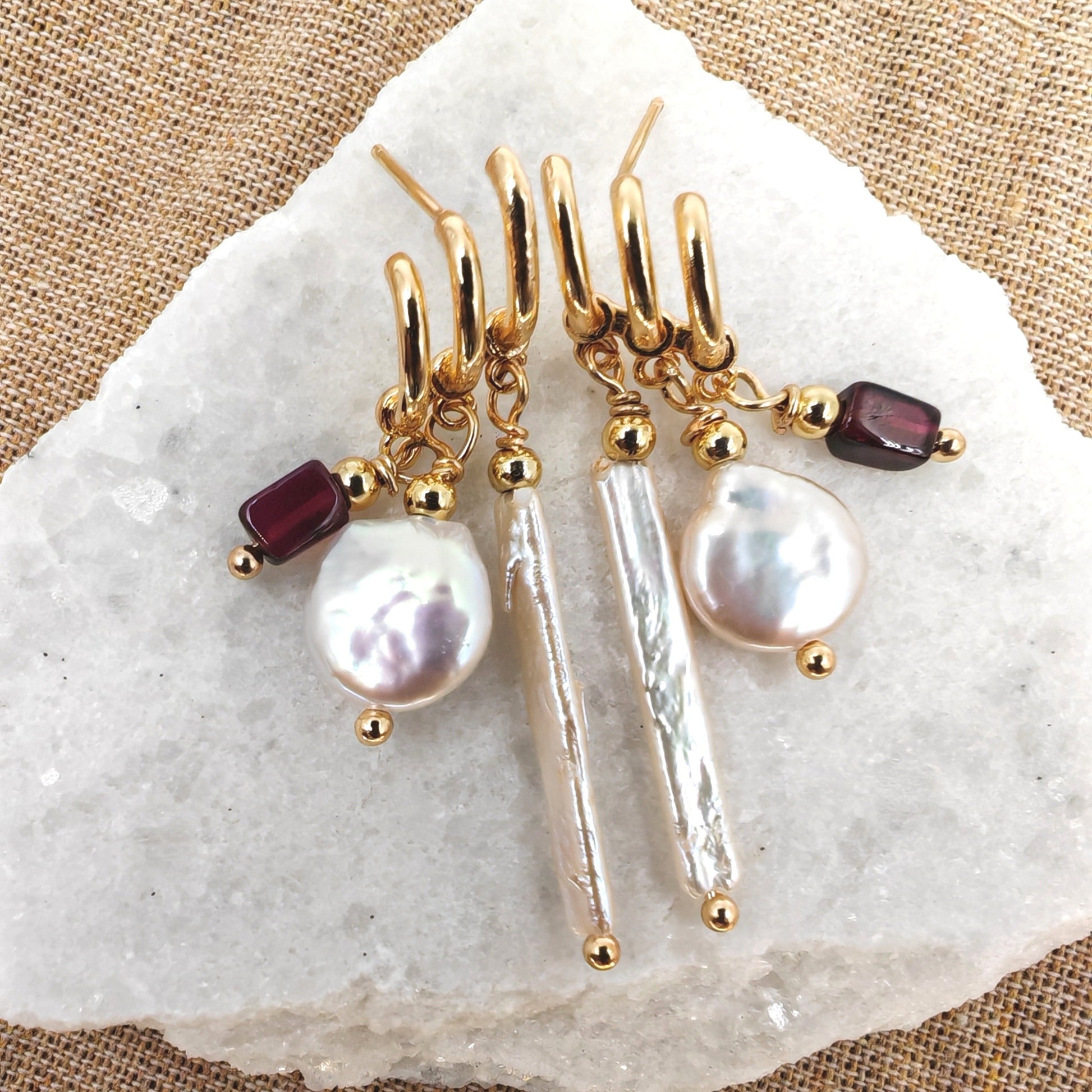 Earring with silver needle post, 14K gold-plated brass triple dangle, baroque pearls, and garnet