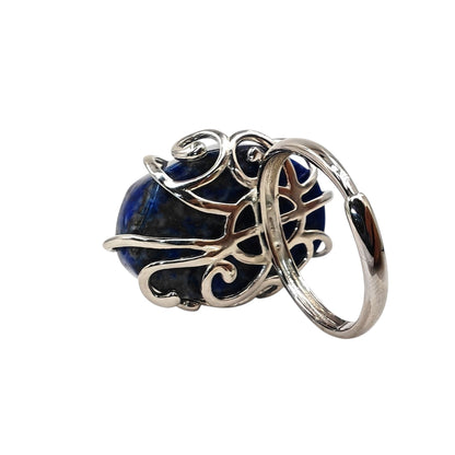 Side view of lapis lazuli ring showing depth and wirework