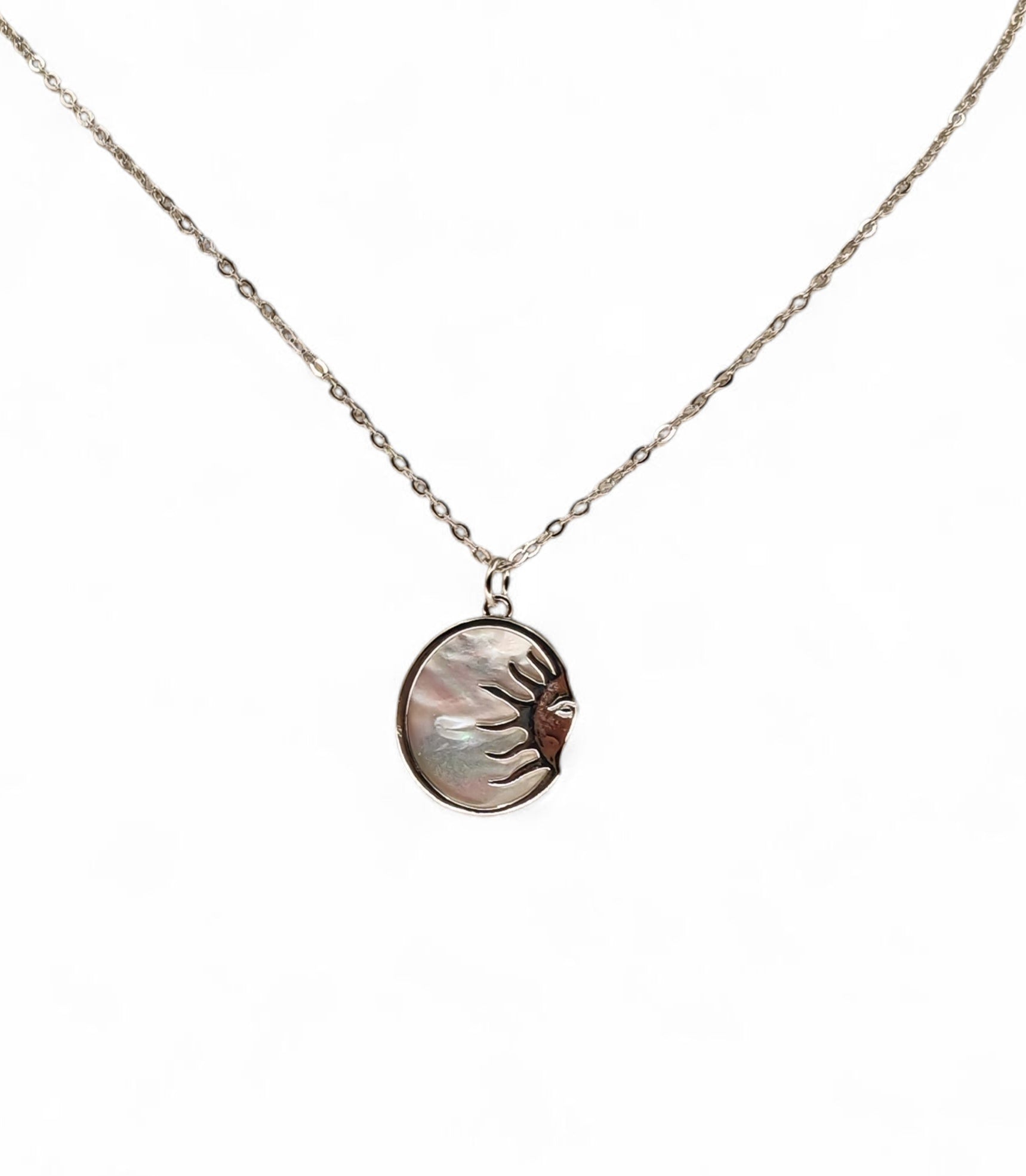 Close-up of oval mother-of-pearl pendant 