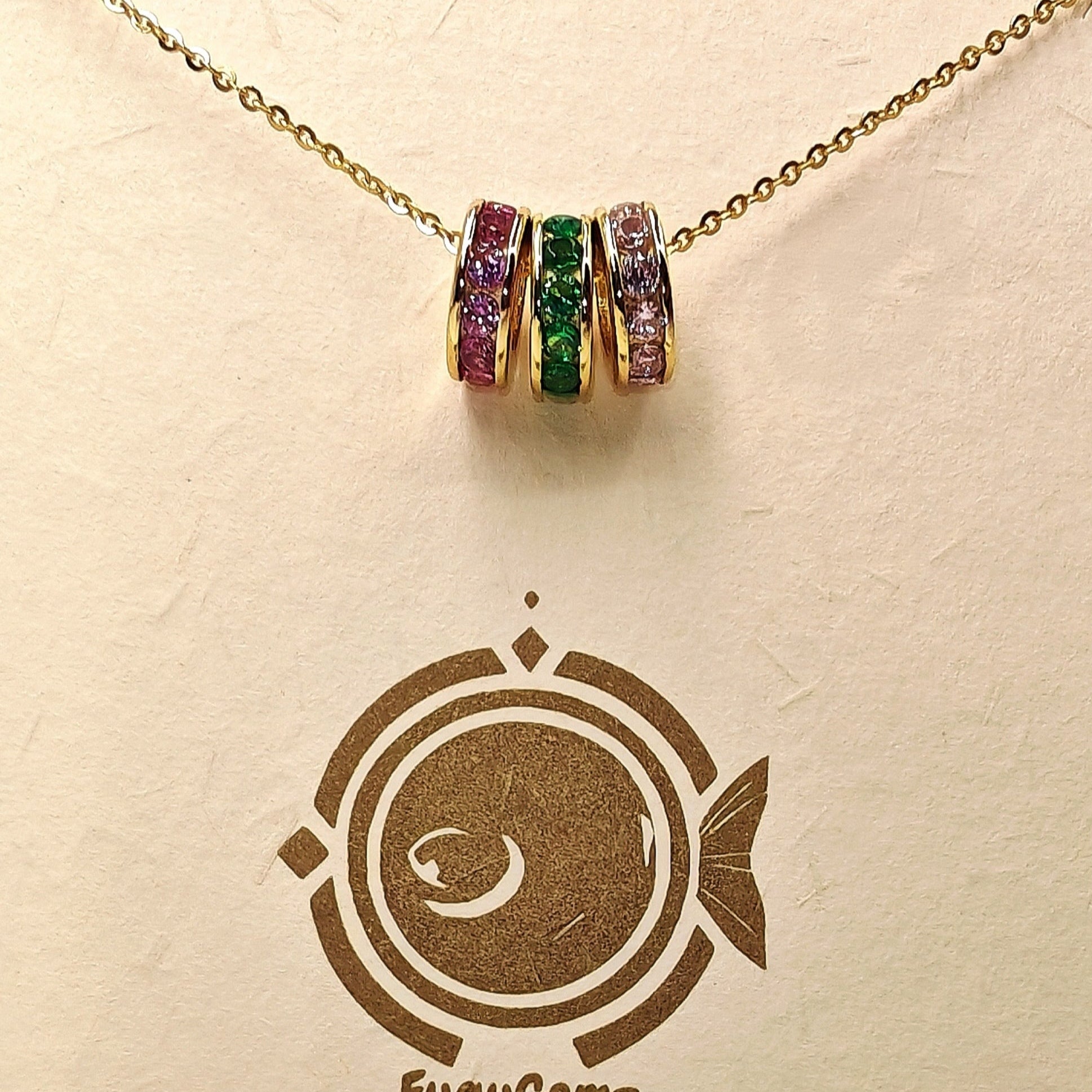 Necklace with colorful gemstones on a FuguGemz branded card