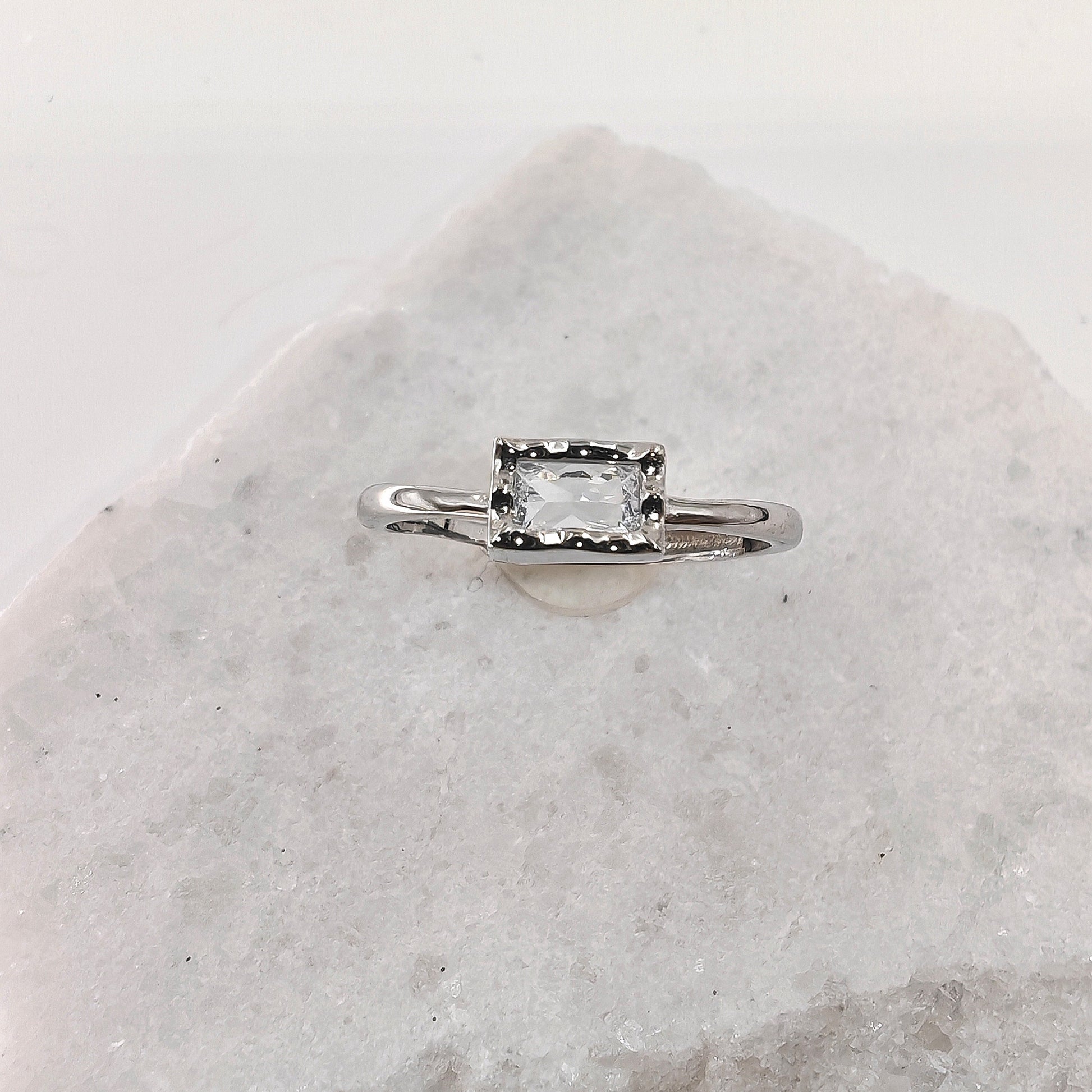 Adjustable 925 sterling silver ring with 4.5mm x 7mm rectangular zirconia