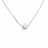 Pearl necklace on a white background