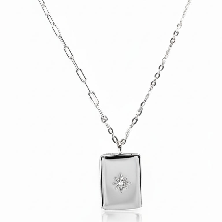 Close-up of rectangular pendant and zirconia star