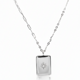 Close-up of rectangular pendant and zirconia star