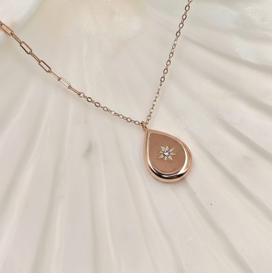 Close up Rose Gold tear drop pendant