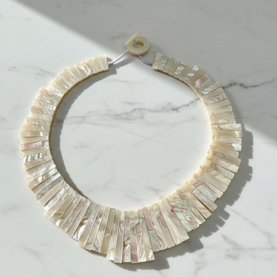 45cm large white mother of pearl segment necklace on white background
