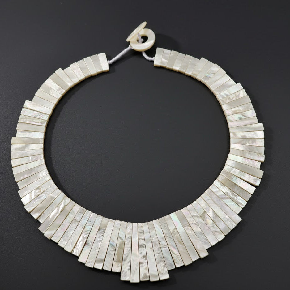 45cm large white mother of pearl segment necklace on white background
