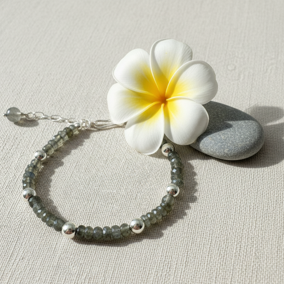 Bracelet with a white flower on a light background