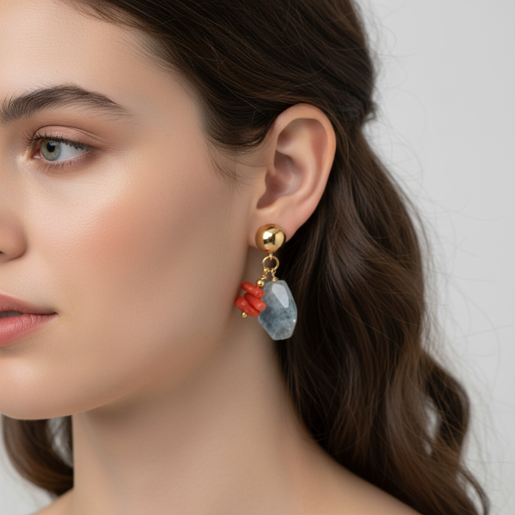 Close-up of a woman wearing colorful earrings with a neutral background